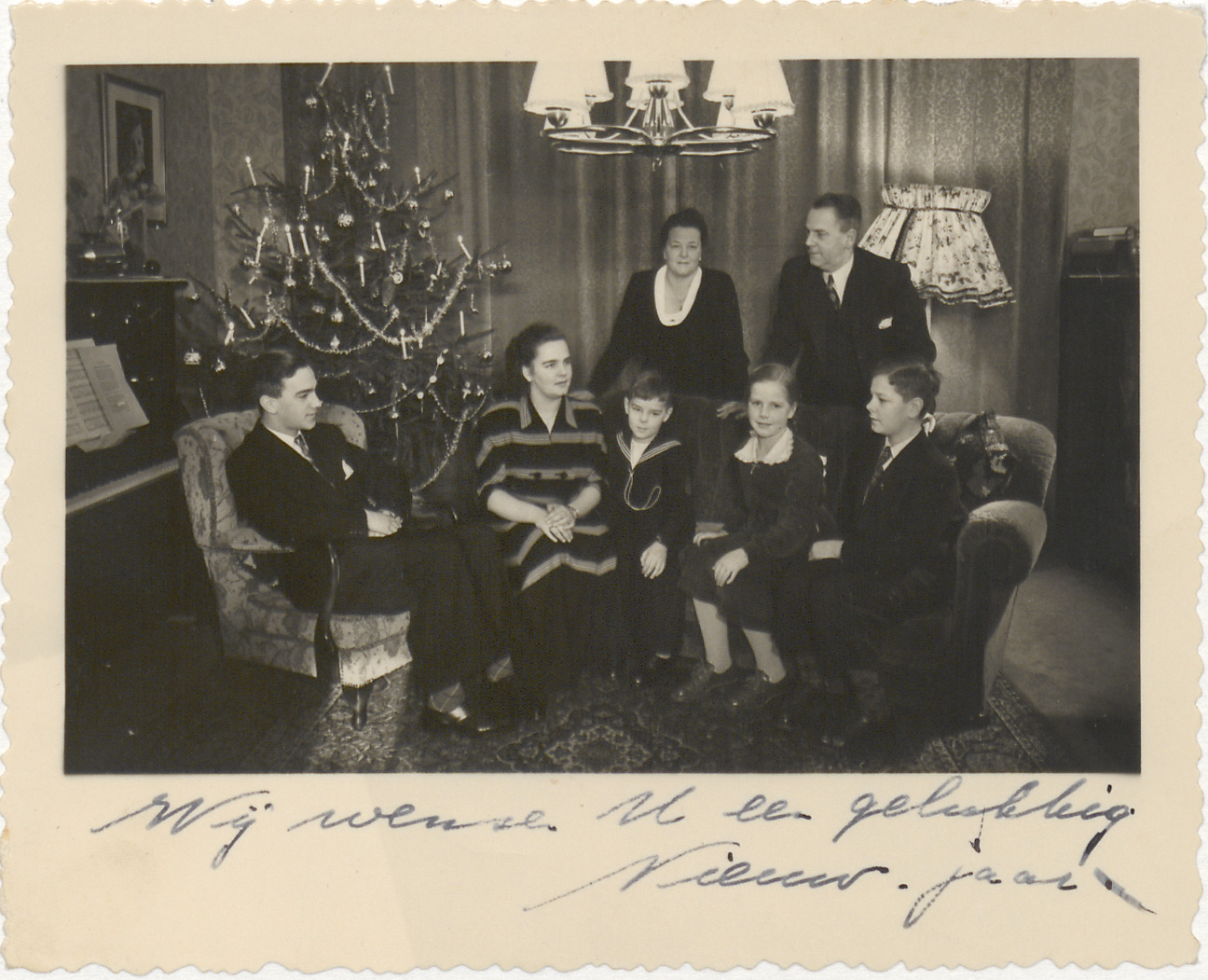 oude kerstkaart met gezinsfoto